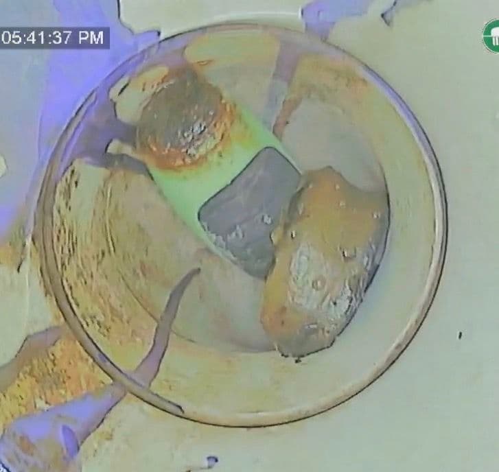 A Screwdriver Was Causing This Guest Bathroom's Recurring Backup