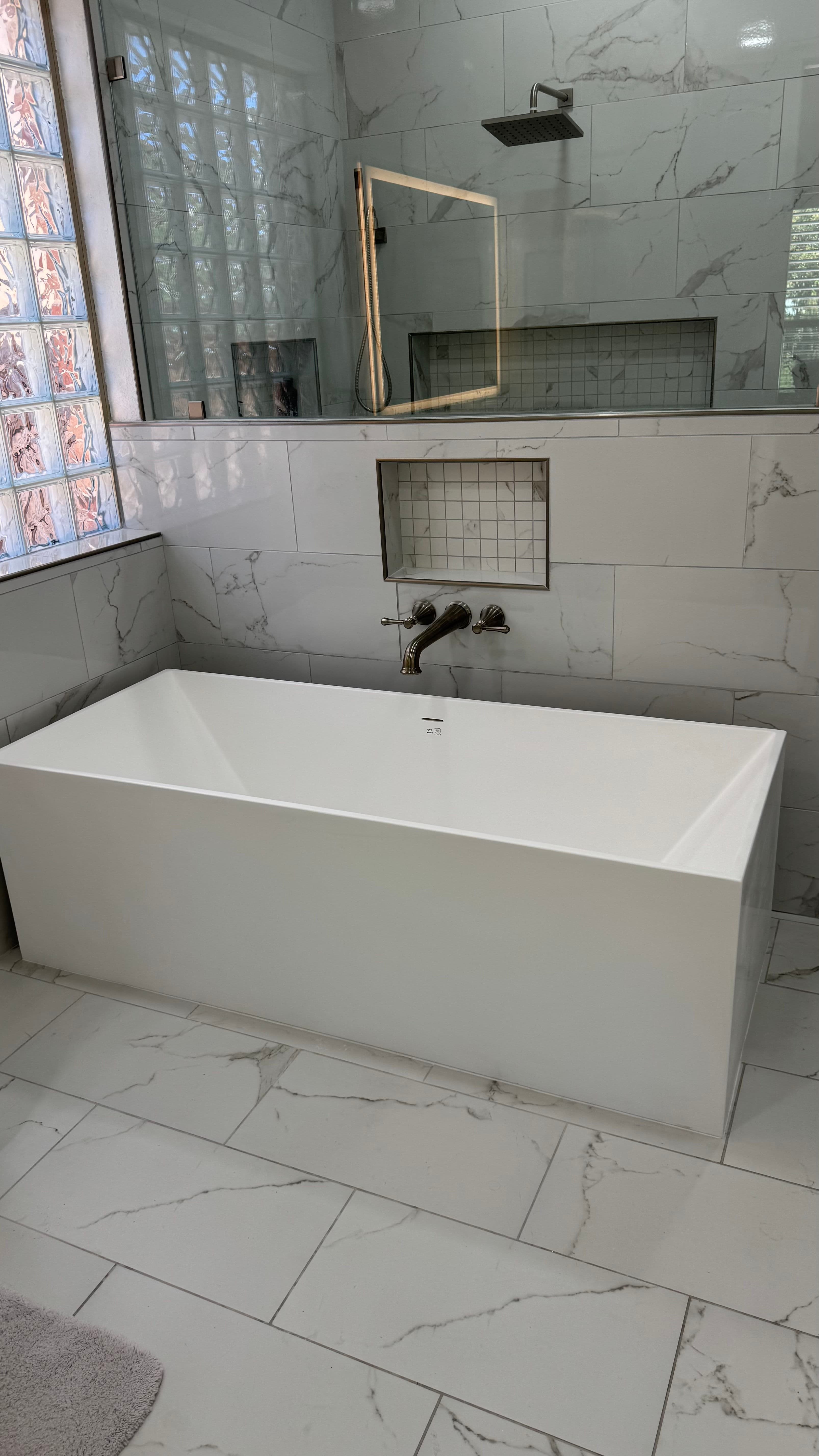 Project 600-lb Stone Tub Install in a Stone Oak Primary Bathroom image